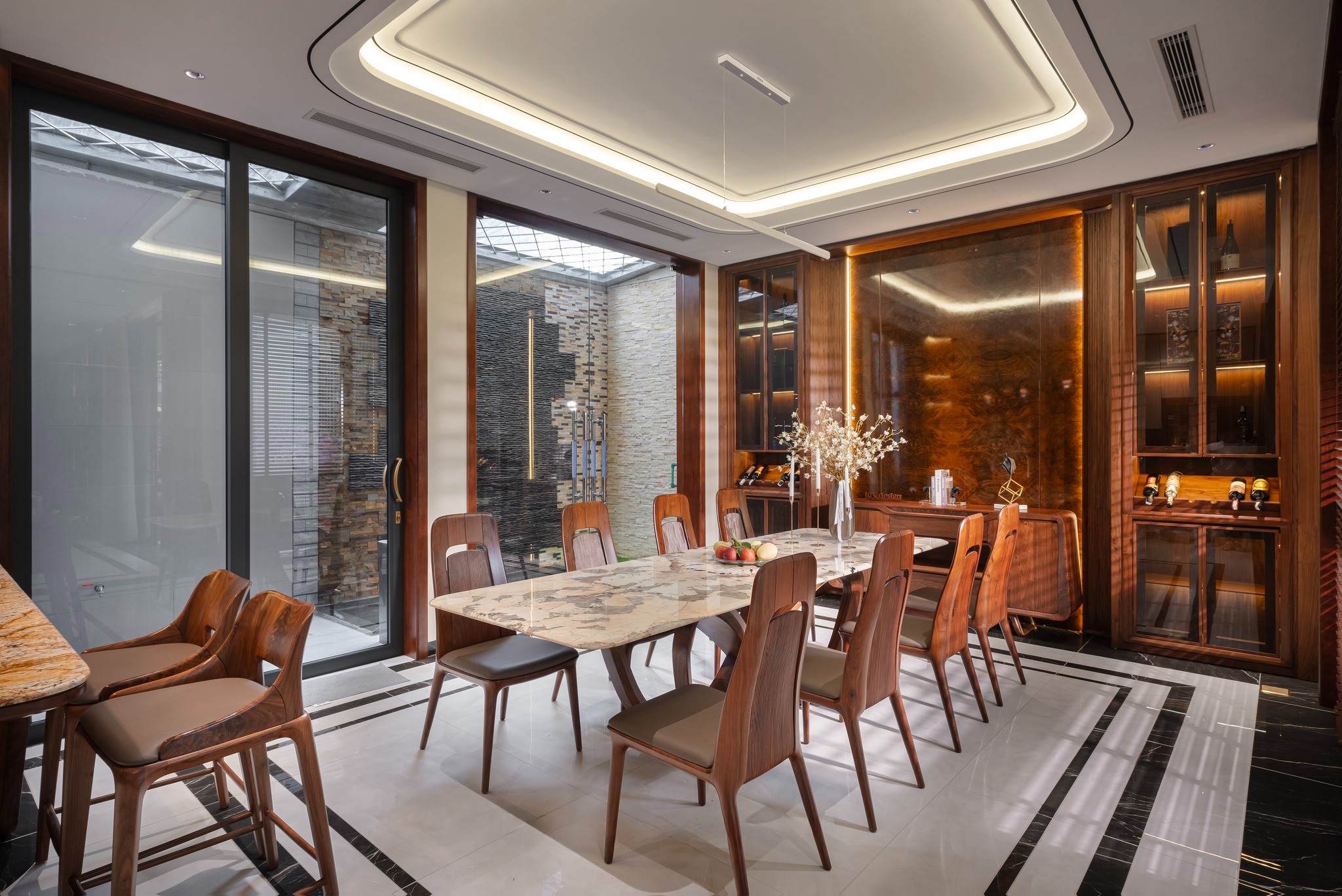 Bộ bàn ăn mặt đá chữ nhật 10 ghế hiện đại gỗ óc chó và đệm da ghi nhạt Bộ bàn ăn mặt đá chữ nhật 10 ghế hiện đại gỗ óc chó và đệm da ghi nhạt